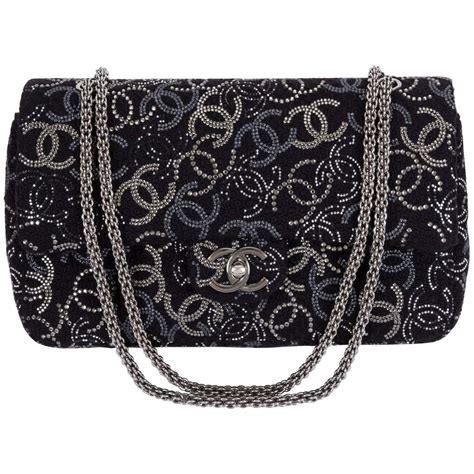 chanel crystal logo clutch